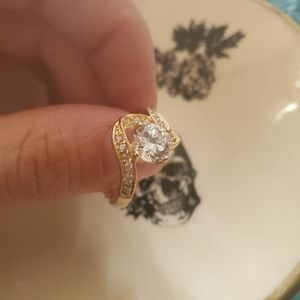 Gold tone, costume ring